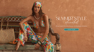 Model wearing a tropical print bottom and top. Summer Style elevated. Shop new. 