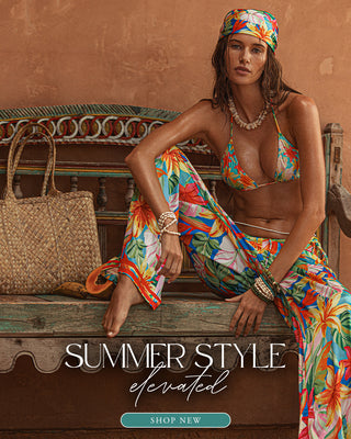 Model wearing a tropical print bottom and top. Summer Style elevated. Shop new. 