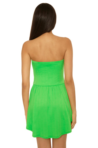 Green strapless dress worn by a model on a white background
