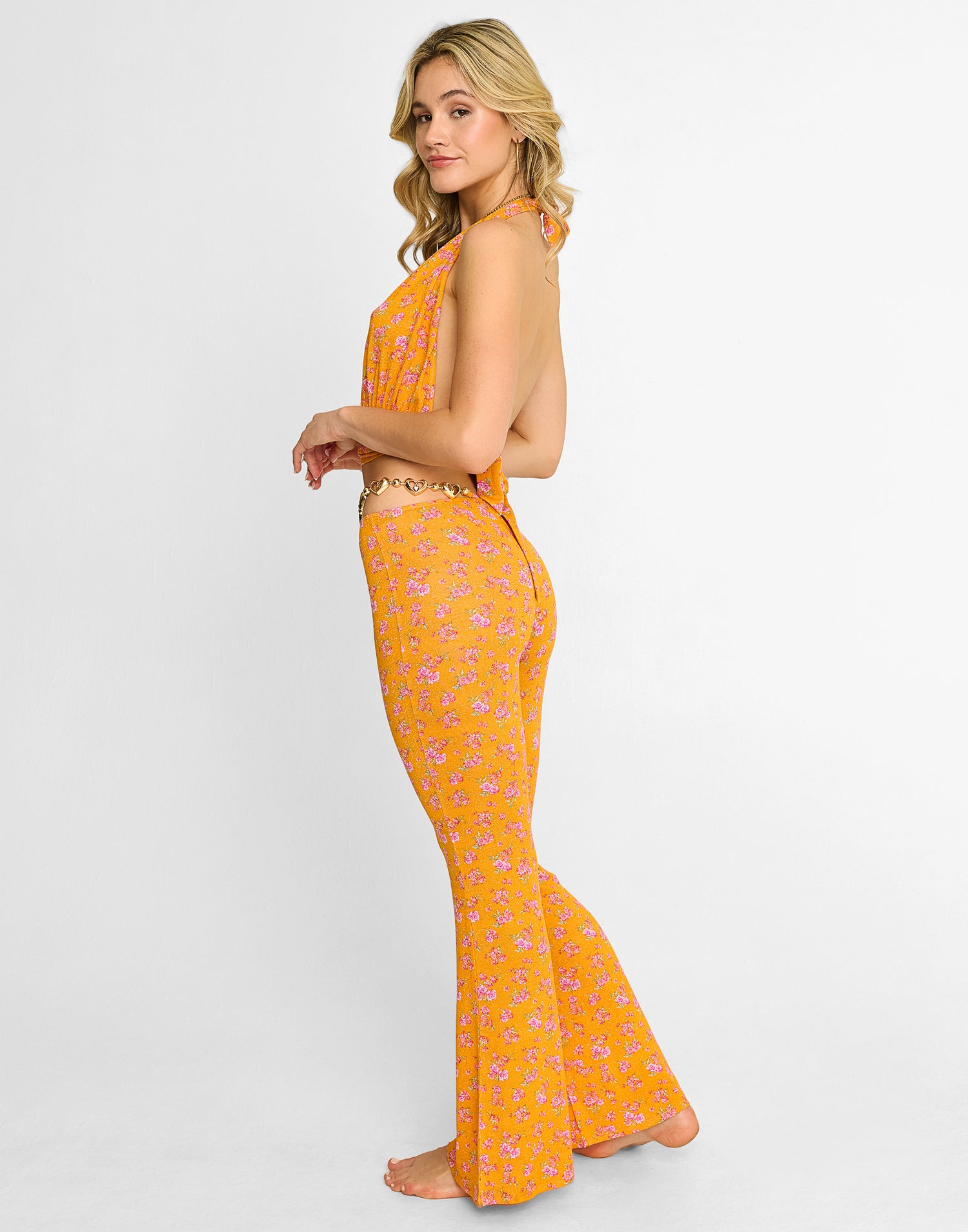 Saddie Knit Pant Cover Up in Orange Ditsy Floral with Gold Heart Hardware - Back View