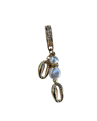 Gold earring with pearls and gemstones on a white background