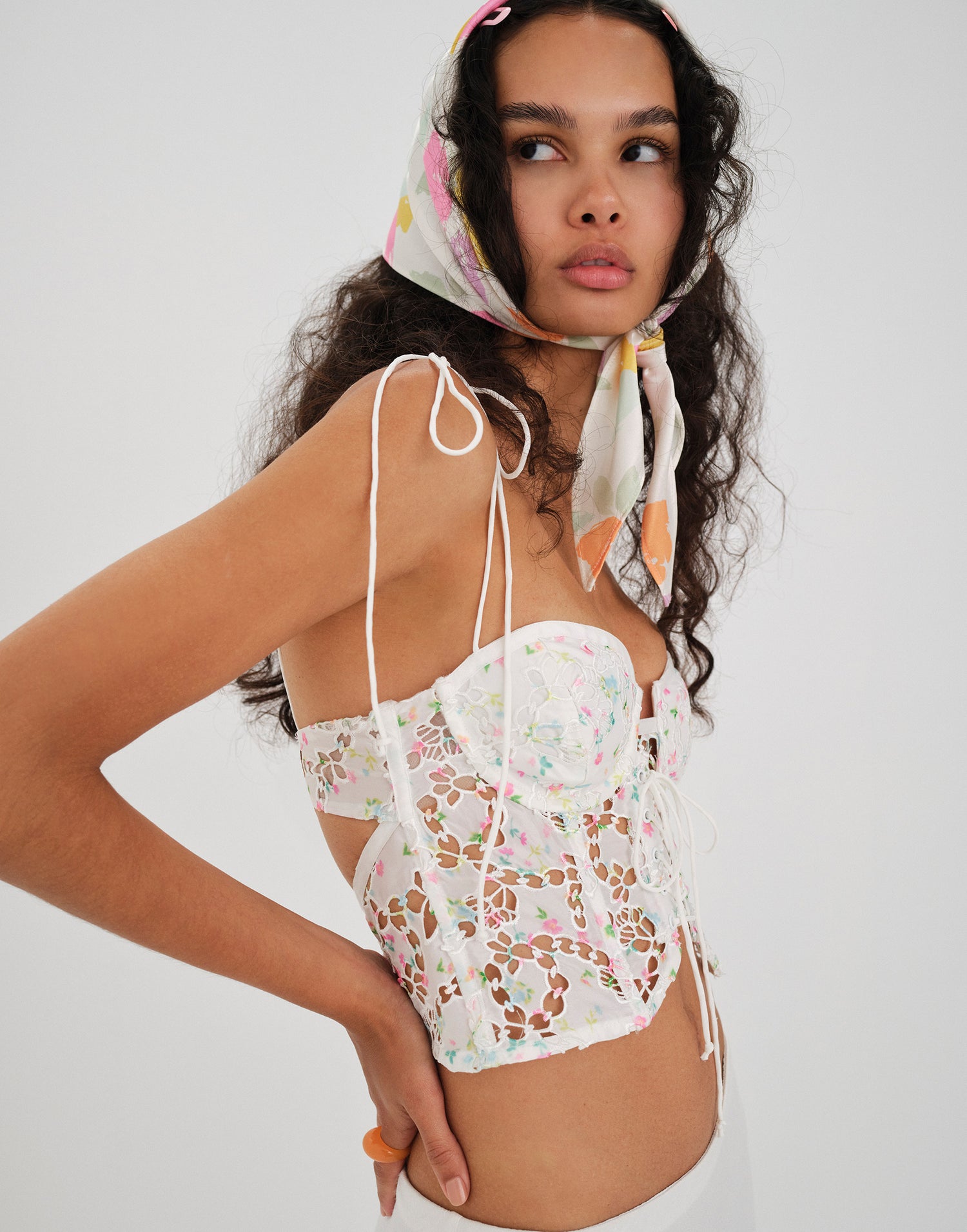 Kyra ﻿Laser-Cut Printed Taffeta Corset Crop Top by For Love & Lemons in White - Angled View