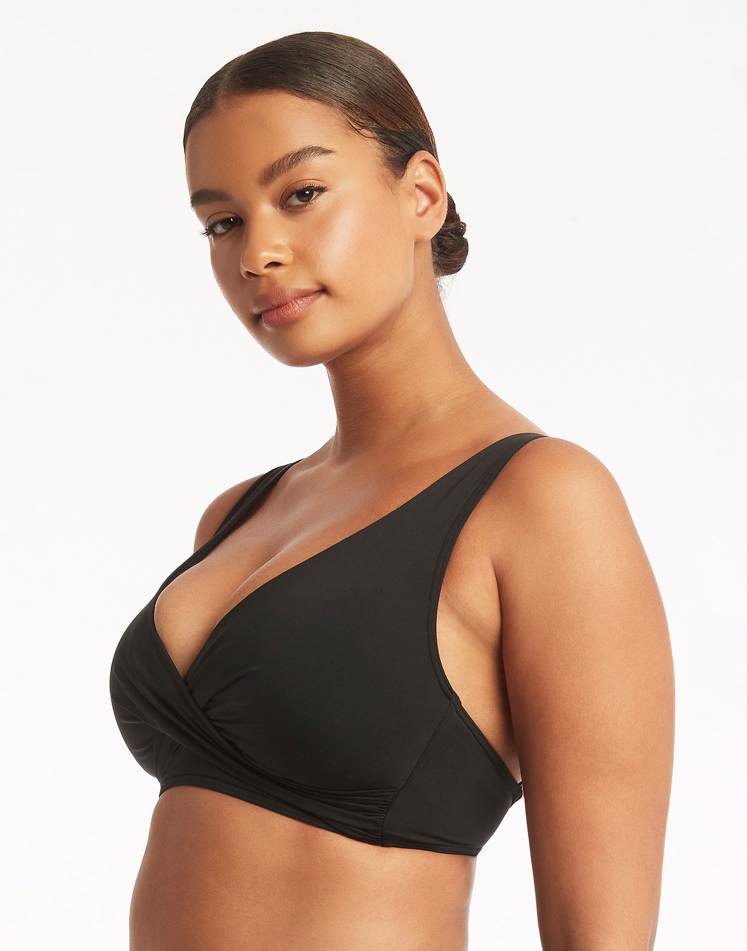 Essentials Multifit Halter Top by Sea Level in Black - Angled Detail View